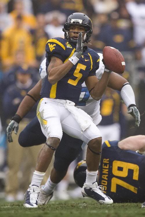 Pat UNC Pat White's performance in the 2008 Meineke Car Care Bowl against North Carolina has The Q-Bot smiling from bolt to bolt.